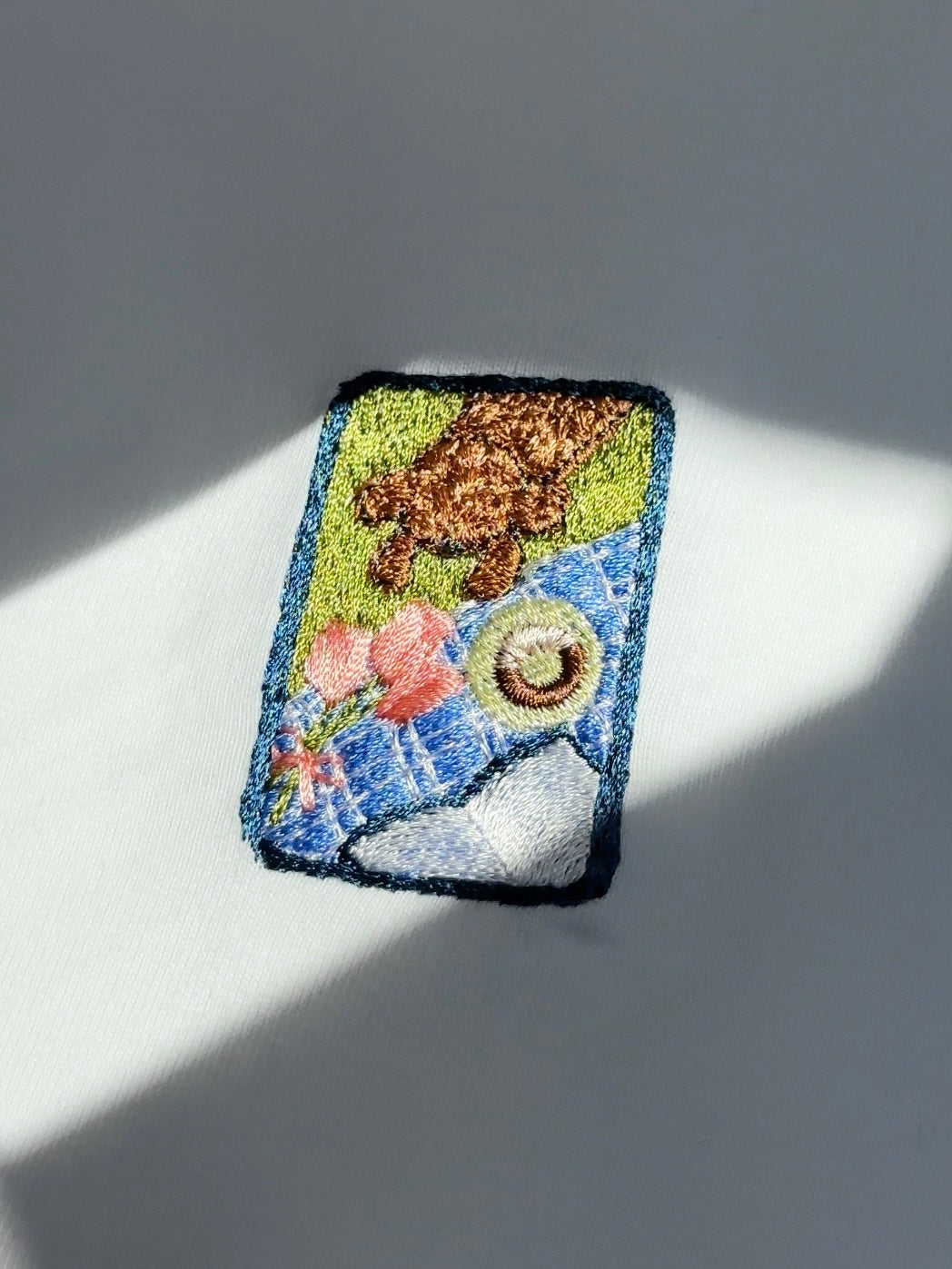 ドーナッツを狙うわんこ(スウェット)