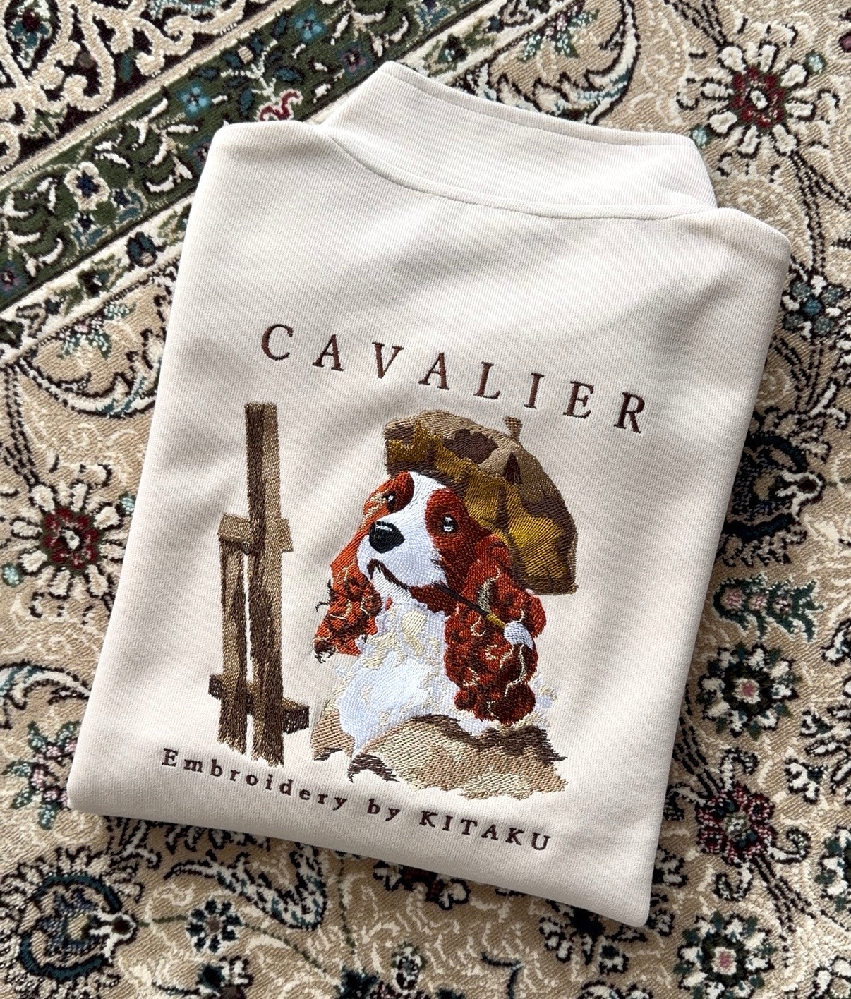 キャバリア画伯のハーフジップ